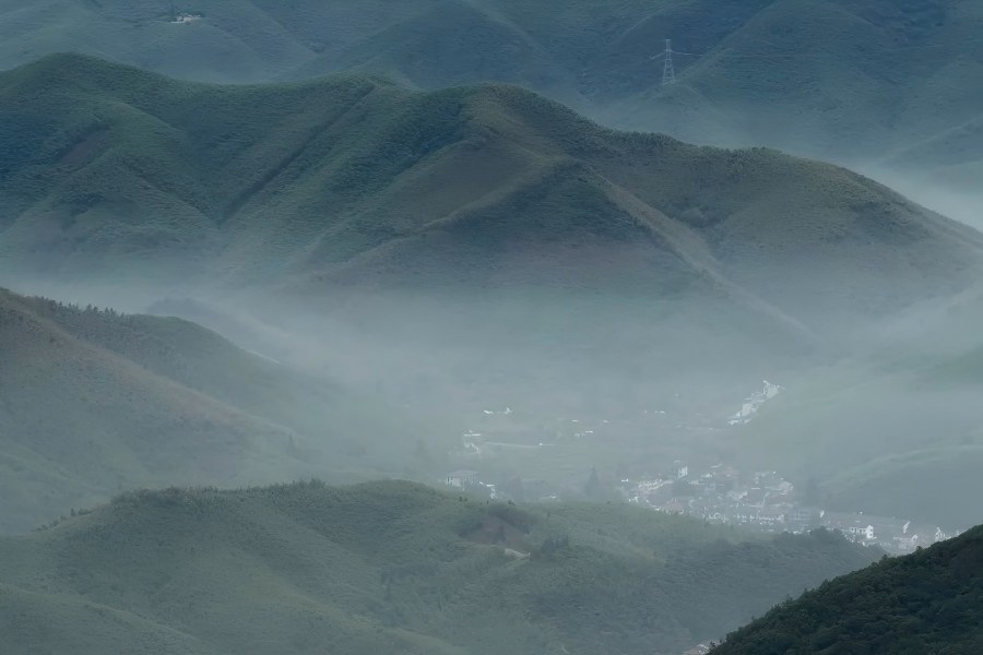 Moganshan in Deqing showing rolling green mountains and natural mountain-side