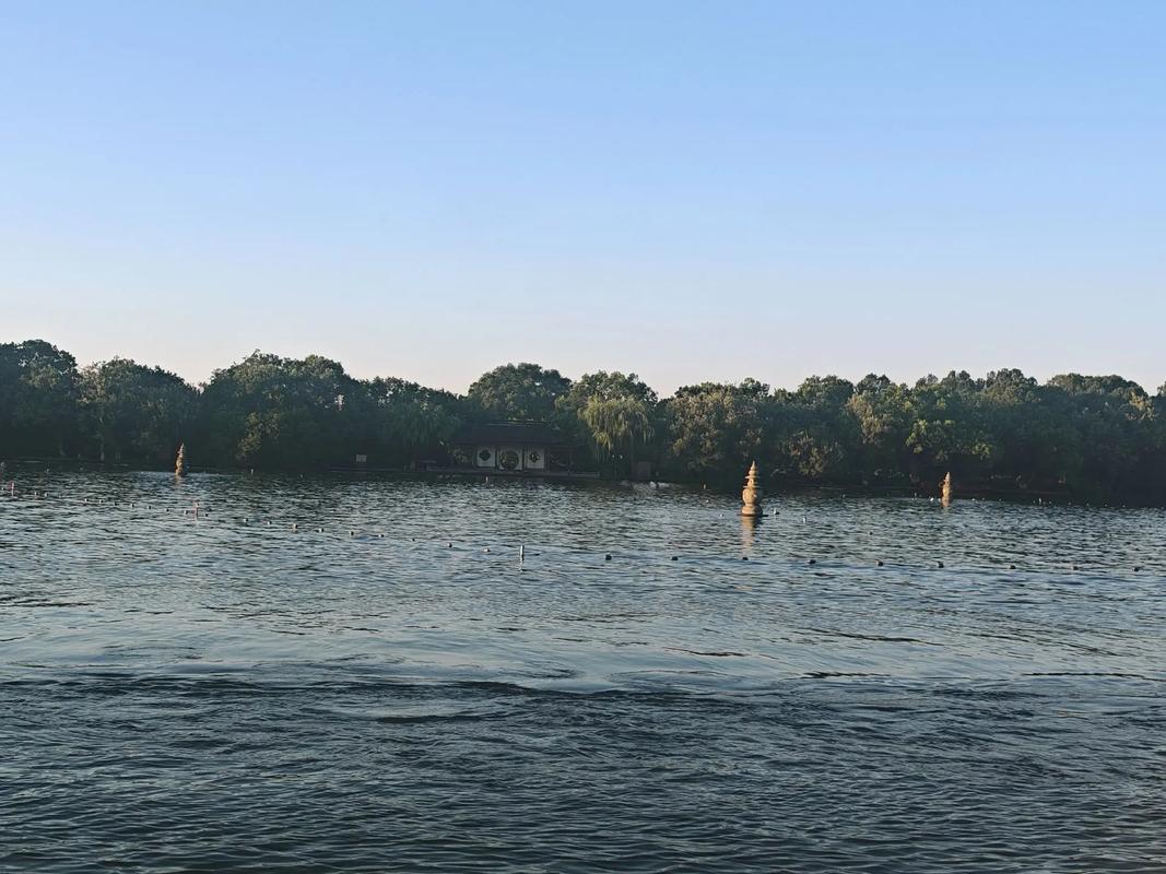West Lake in Hangzhou featuring UNESCO World Cultural Landscape with integrated mountains, water, ancient architecture and profound Jiangnan culture