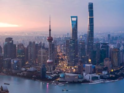 View of Shanghai Pudong skyline featuring Oriental Pearl Tower, Shanghai Tower and SWFC beside Huangpu River